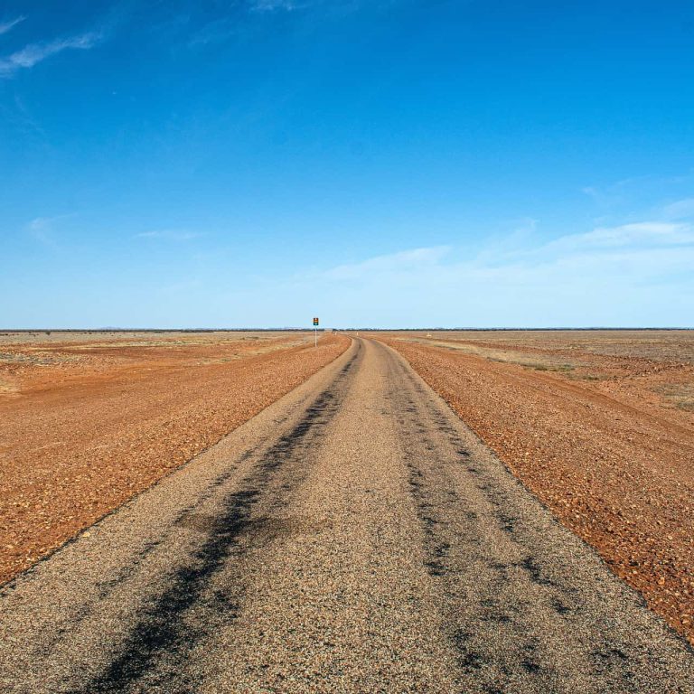 Endless Outback Road Embracing the Solitude of Australia's Open Landscapes